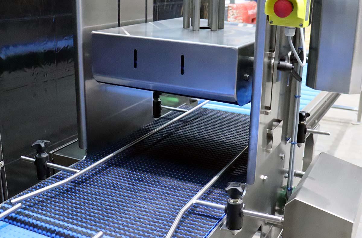 Lid Pressing Conveyor from ENE Conveyors | UK & Ireland